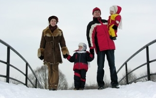 family crossing bridge