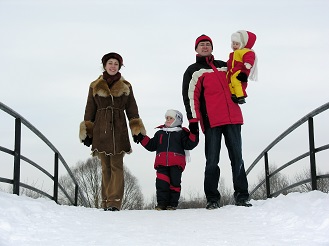 family crossing bridge